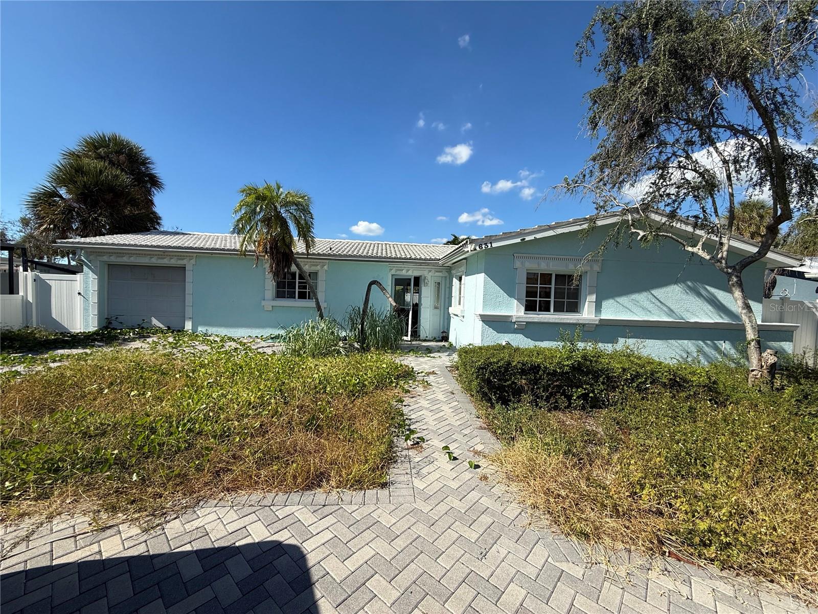Great opportunity for this concrete block home just a couple of lots away from the Blind Pass. The home has flood damage and has had drywall remediation. Nice floorplan. Grreat opportunity to renovate.