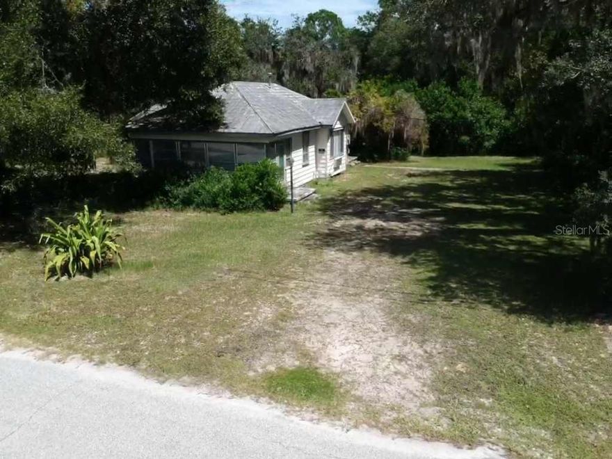 Beautiful 1.14 Acres in a sought after area of New Smyrna Beach. Property has 200' frontage on Brookline Ave and 153' on North Street with possibility of additional frontage on a platted but not completed portion of Edgewater Ave. Property was originally platted as 8 lots. Property includes a 3 bedroom/2 bath home, detached in-law suite, and multiple out structures. The main house has a large family room that could also be a large master bedroom, kitchen is open to dining room, there's also a Florida room with lots of windows, and a concrete patio area. In-law suite has a kitchen open to the living area and private bathroom. Home and all structures are in need of major rehab. Lots of possibilities, subdivide the property for multiparcel sale, rehab the home, or both. Lots of room for your boat and RV parking, No HOA. Only minutes to the beach and public boat launch on the Intracoastal Waterway. Close to shopping, dining, parks, schools, and more. Close to Orlando, major airports, Disney and other amenities. ;Water: City