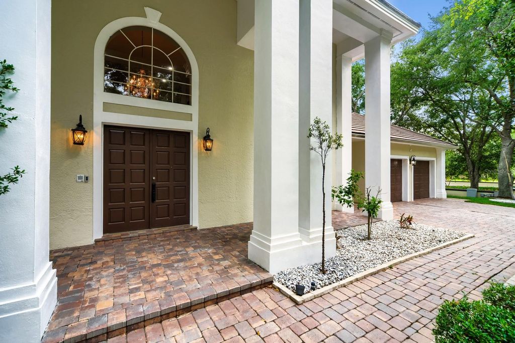 Photo of 7601 Debeaubien Drive, Orlando, FL 32835 (MLS # TB8503272)