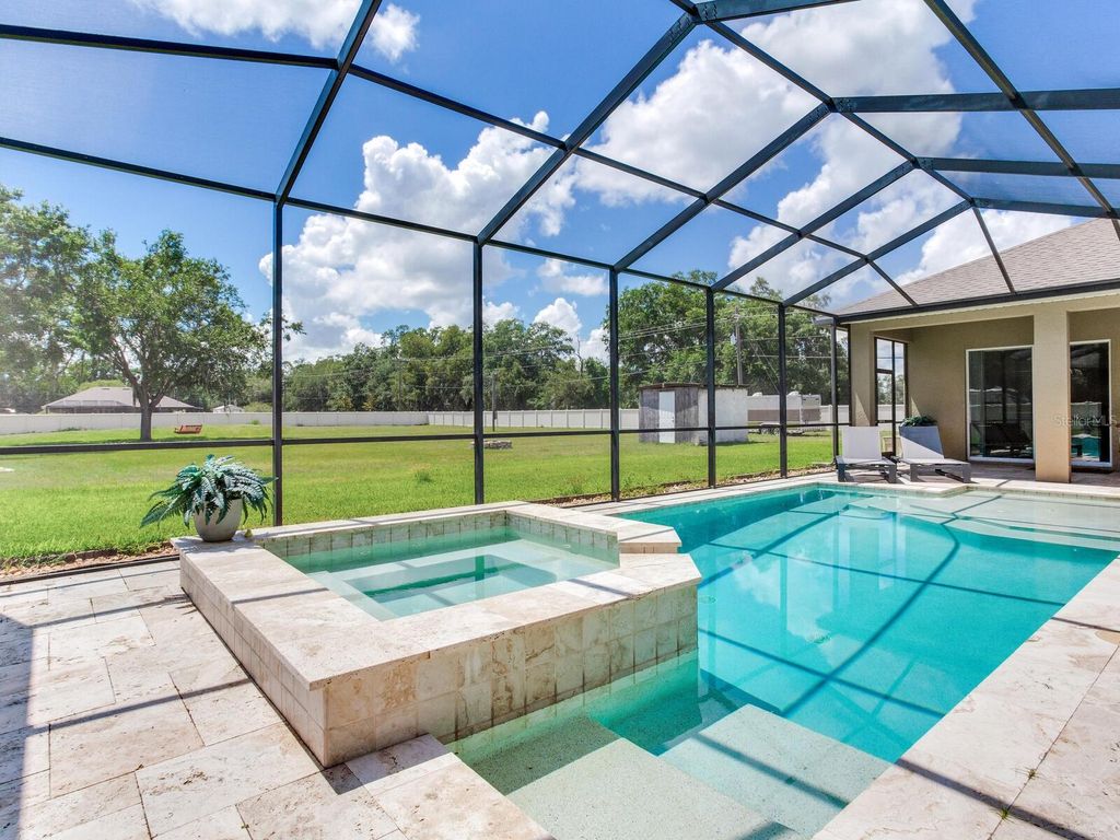 Photo of 16220 Lake Armistead Way, Odessa, FL 33556 (MLS # TB8386008)