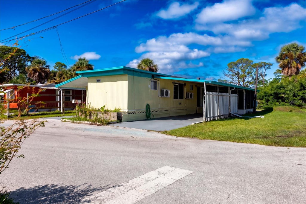 Photo of 5044 Southtowne Loop, New Port Richey, FL 34652 (MLS # TB8559490)