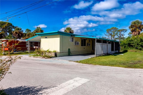 Photo of 5044 Southtowne Loop, New Port Richey, FL 34652 (MLS # TB8559490)