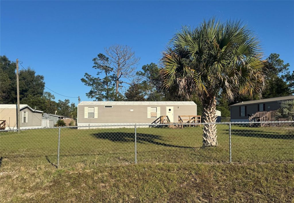 Photo of 4961 NE 141st Terrace, Williston, FL 32696 (MLS # GC535129)
