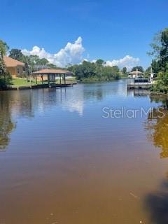 Fantastic Basin View From This 85' Waterfront Saltwater Canal. On Cul-De-Sac Siting Next to a Side Tip Land Is 85' Wide Affording A Larger House Pad and Spectacular Views. These Larger Lots are Becoming Quite Scarce. All Very Nice Homes on Crandell Ct. Drive By and View You Can Build Your Dream Home On the Waterfront. All Offers Considered!