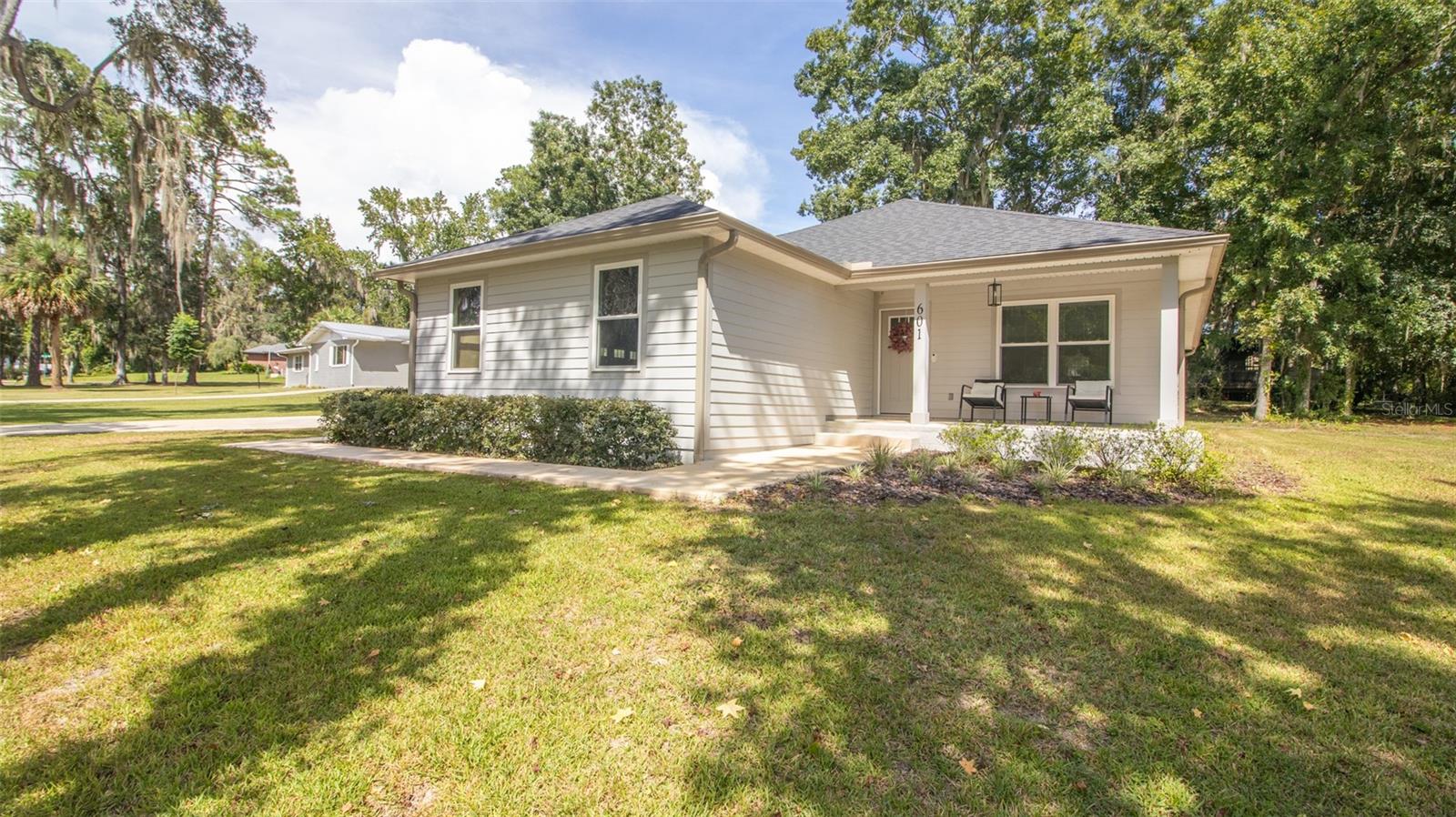 Adorable 3 bedroom 2 bath home in Seminole Ridge with access to Lake Santa Fe with membership! Just grab your kayak and walk across the way to paradise! Open floor plan for a spacious feel for entertaining. Solid surface counters, Indoor laundry with utility sink. Kitchen includes a double pantry with lots of cabinet space. Master suite with beautiful walk-in shower with double sinks. Great neighborhood perfect for first time home buyers or retired couple