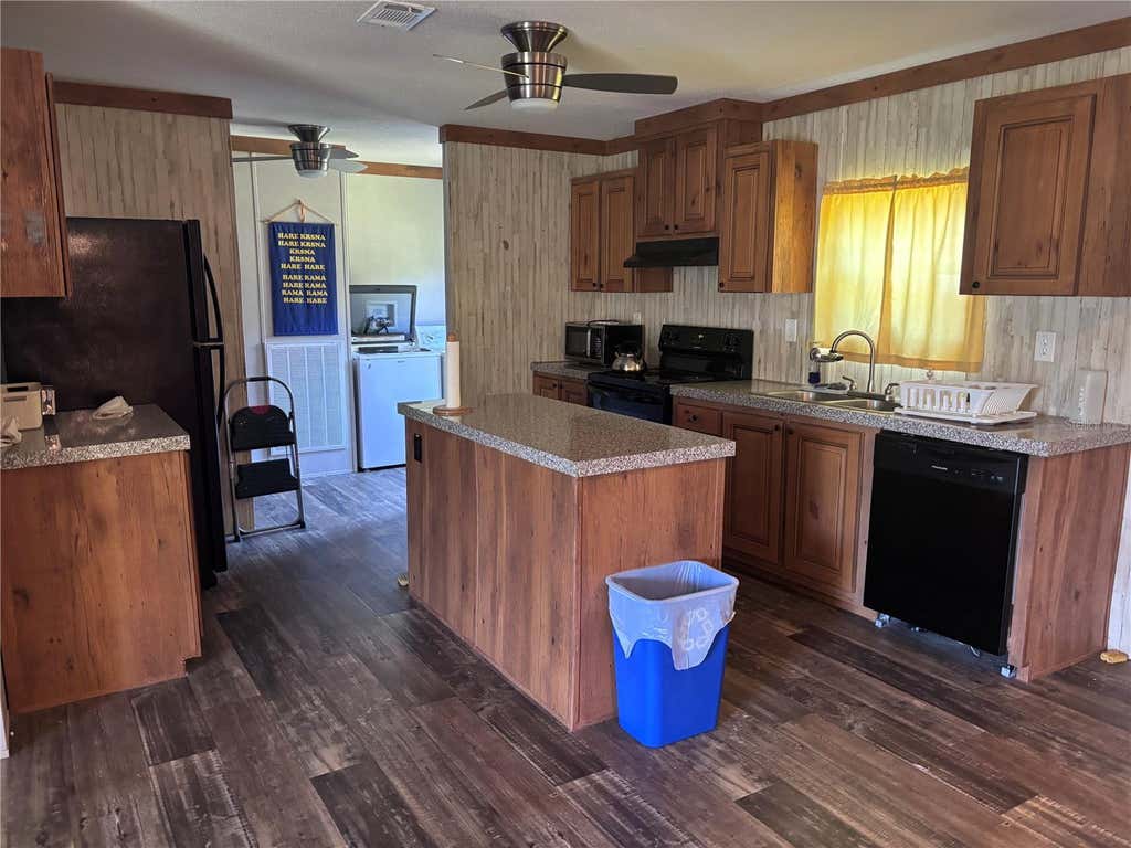 Photo of 133 Oak Circle, Interlachen, FL 32148 (MLS # GC542835)