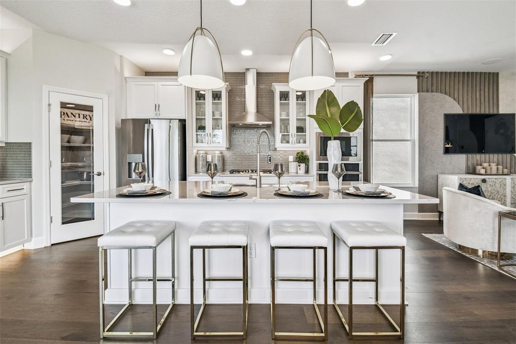 Photo of 17100 Beachgrass Aly, Winter Garden, FL 34787 (MLS # O6407707)