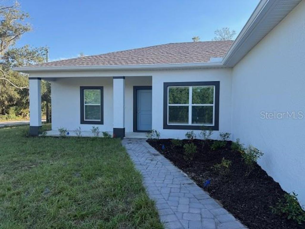 Photo of 14309 Aldridge Avenue, Port Charlotte, FL 33953 (MLS # C7515594)