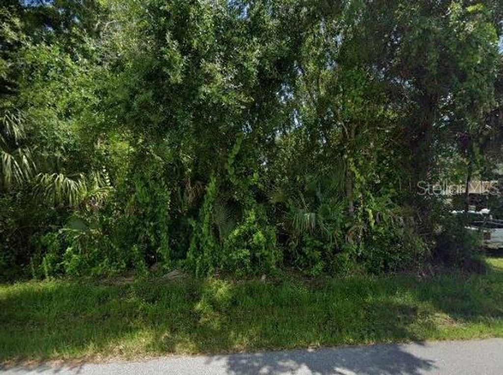 Photo of 22179 Clinton Avenue, Port Charlotte, FL 33954 (MLS # TB8382100)