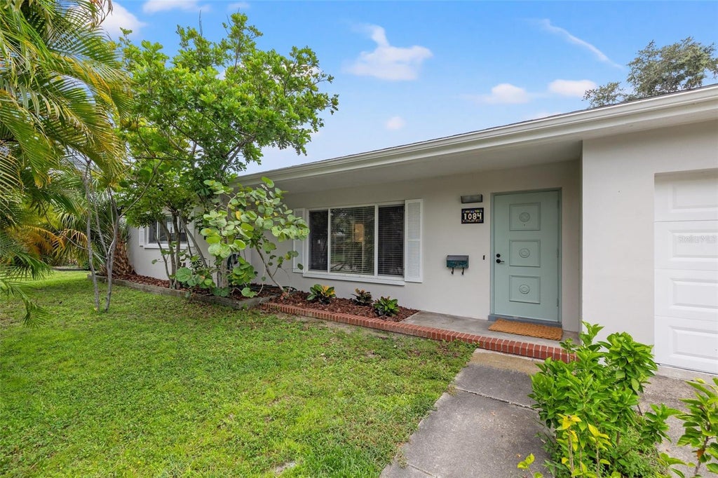 Photo of 1084 39th Avenue NE, St Petersburg, FL 33703 (MLS # TB8561705)