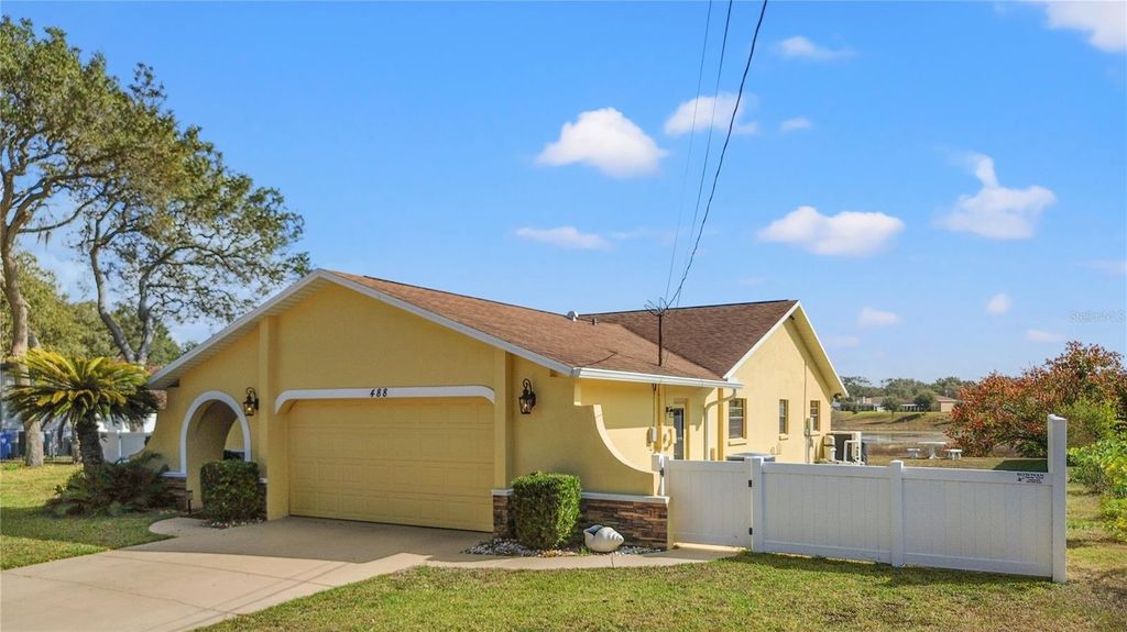 Photo of 488 Fieldstone Lane, Spring Hill, FL 34606 (MLS # TB8451608)