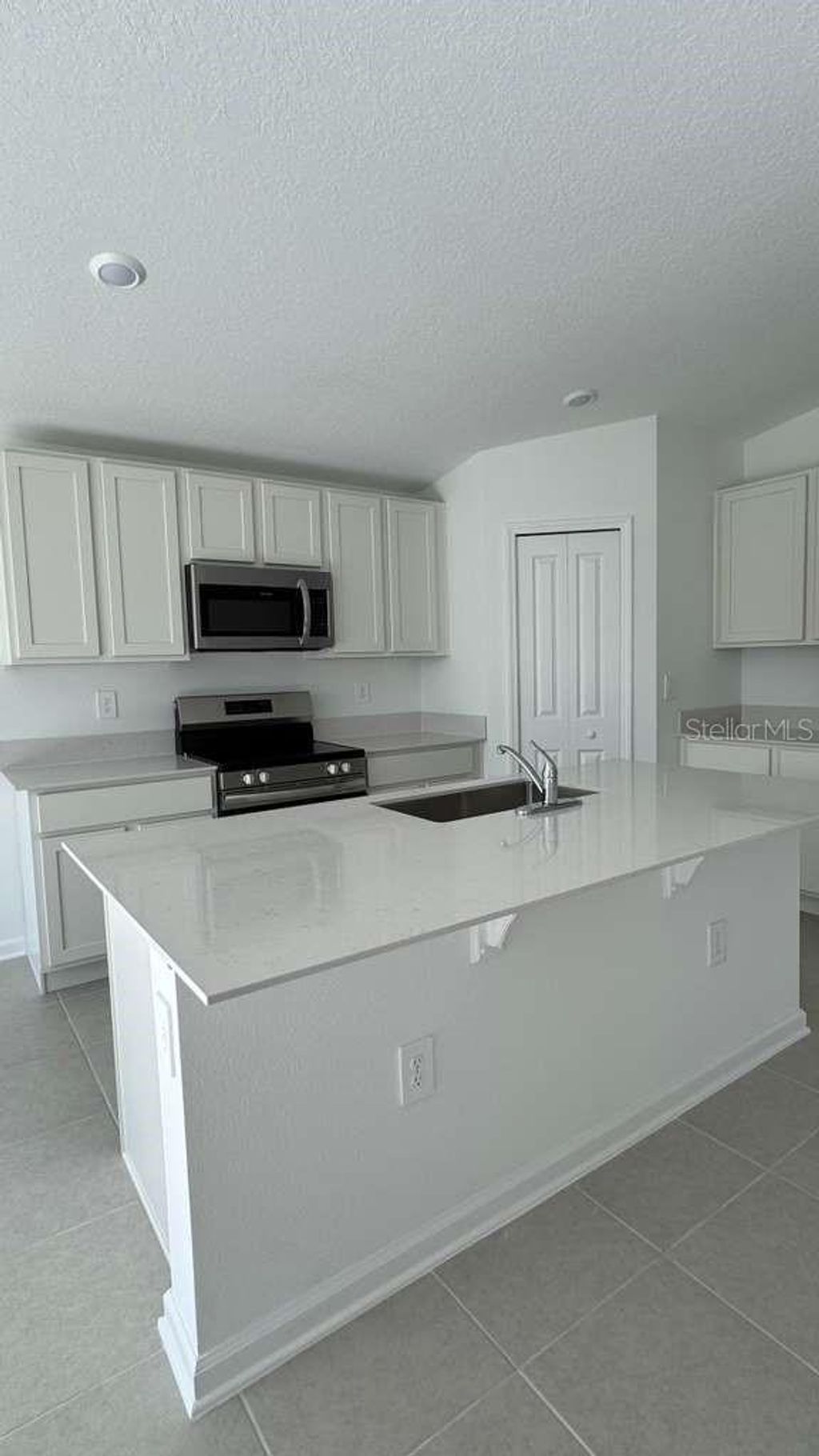 Photo of 5161 Green Belt Drive, Haines City, FL 33844 (MLS # O6398774)