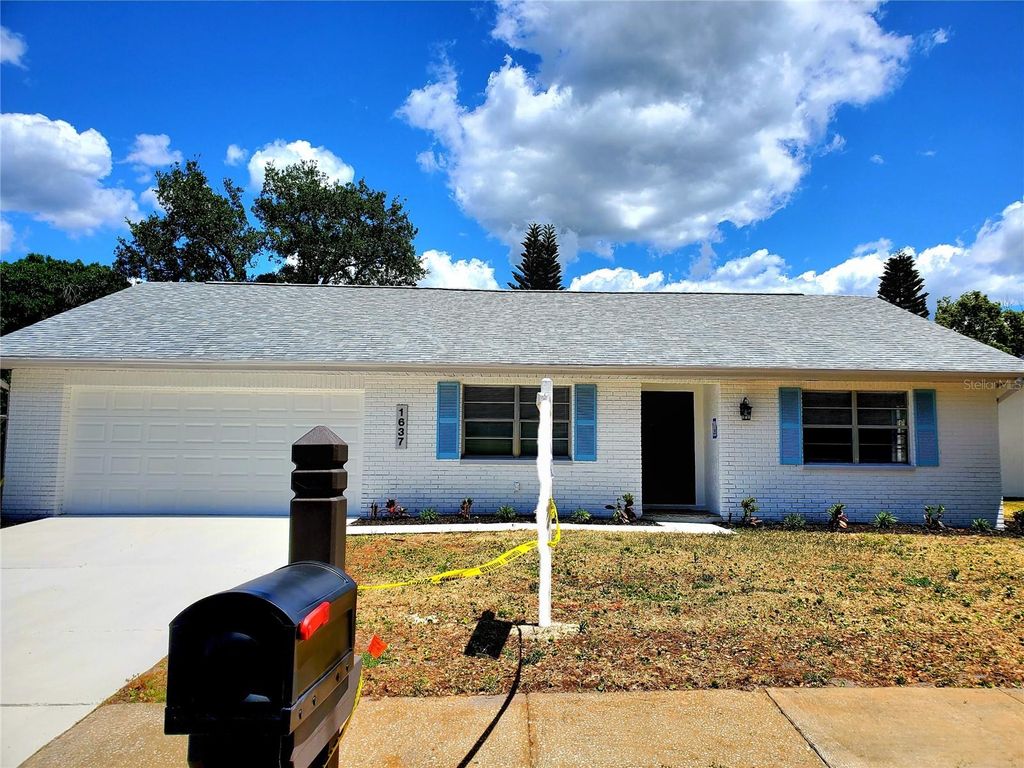 Photo of 1637 Caledonia Drive, Palm Harbor, FL 34684 (MLS # TB8492628)