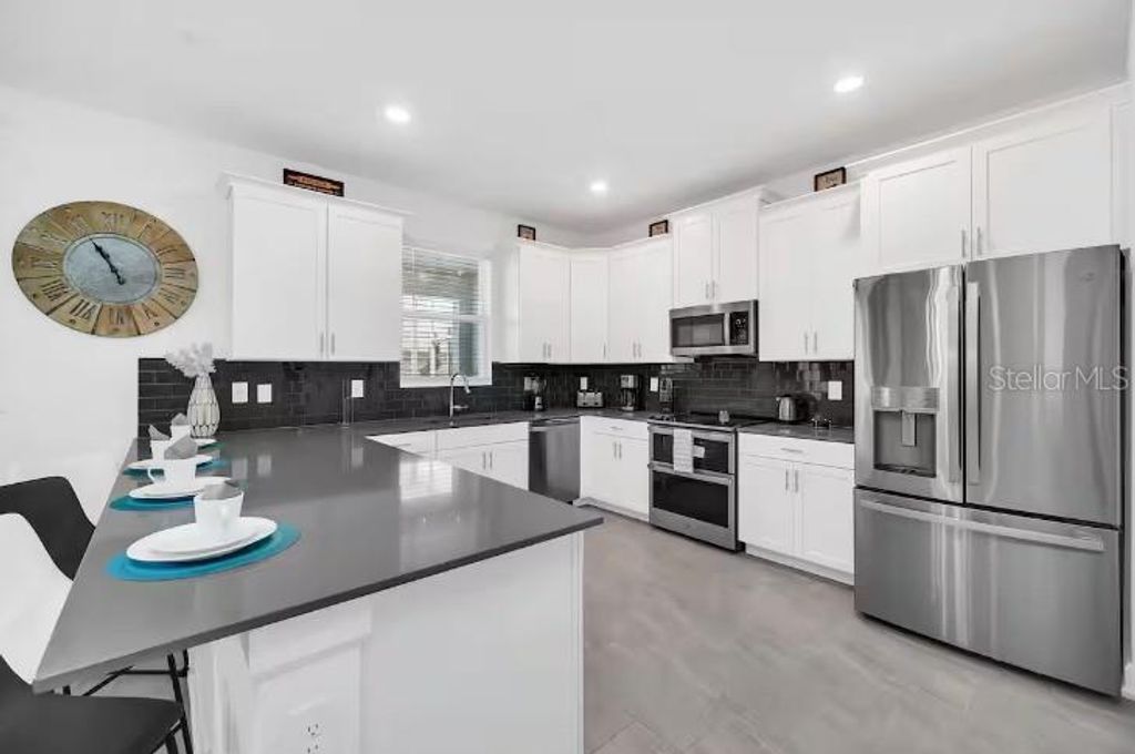 Photo of 9092 Sommerset Hills Drive, Davenport, FL 33896 (MLS # S5140786)