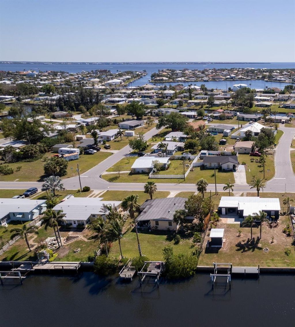 Photo of 125 Palmetto Circle NE, Port Charlotte, FL 33952 (MLS # A4670854)