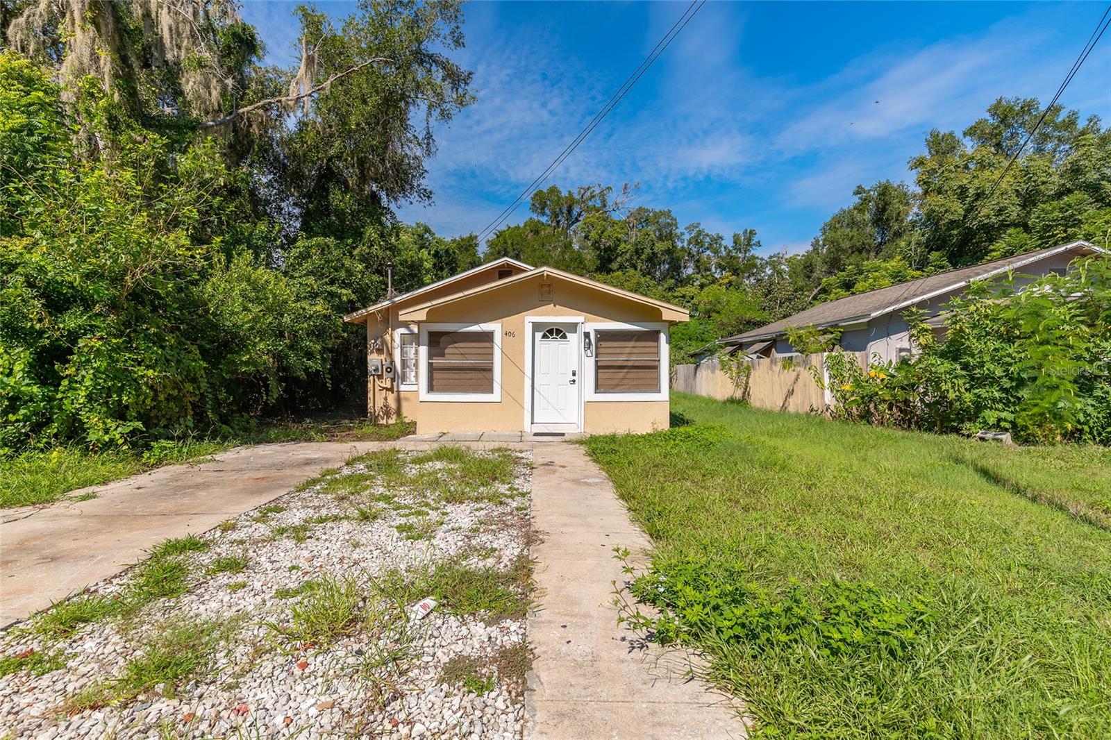 Discover your dream home in this beautifully renovated 3-bedroom, 1-bathroom residence located just minutes from the charming Historic Downtown Deland. Step inside to find a bright, open interior featuring all-new tiled flooring, fresh paint, modern lighting, and stylish fixtures throughout. The brand-new kitchen is a showstopper with gleaming stainless steel appliances, marble countertops, and ample cabinetry—perfect for both everyday living and entertaining. The remodeled bathroom offers wall-to-floor tile and all-new fixtures, combining elegance with functionality. Each of the three comfortable bedrooms has been thoughtfully updated, and the versatile sunroom doubles as an ideal home office, creative studio, or potential fourth bedroom. Outside, the huge backyard provides plenty of space to park your RV, boat, trailers, or extra vehicles, with room left over to create your own outdoor retreat. Move-in ready and designed for both comfort and convenience, this home is the perfect blend of modern updates and prime location. All information deemed accurate but cannot be guaranteed. Water Heater 2025, HVAC 6 years.