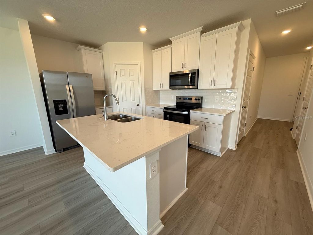 Photo of 16386 Bird Of Paradise Avenue, Clermont, FL 34714 (MLS # O6354180)