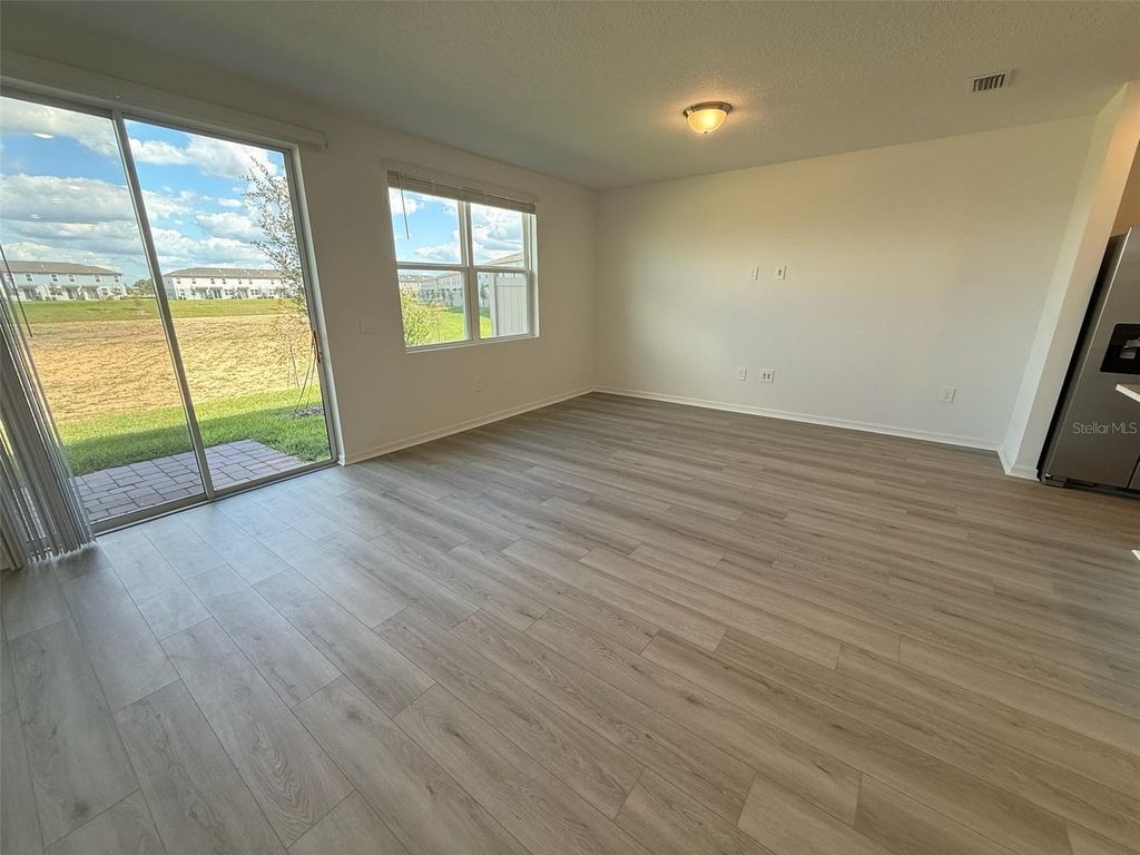 Photo of 16386 Bird Of Paradise Avenue, Clermont, FL 34714 (MLS # O6354180)