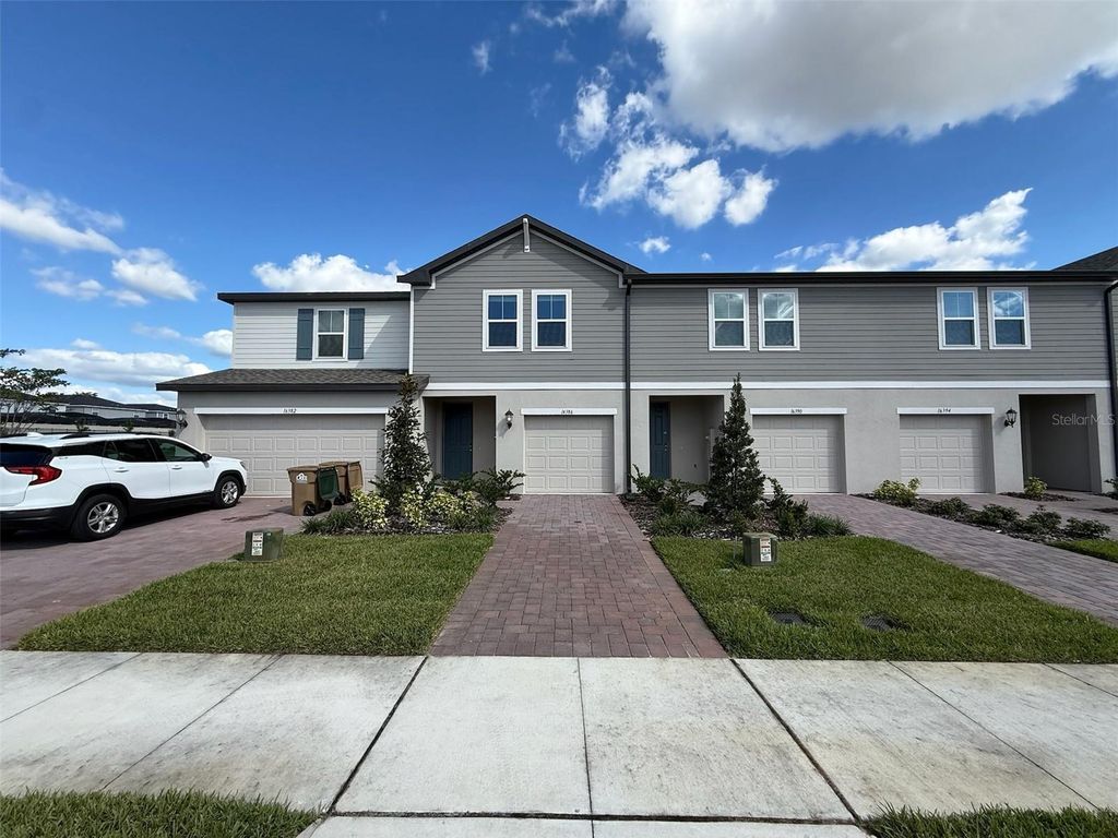Photo of 16386 Bird Of Paradise Avenue, Clermont, FL 34714 (MLS # O6354180)