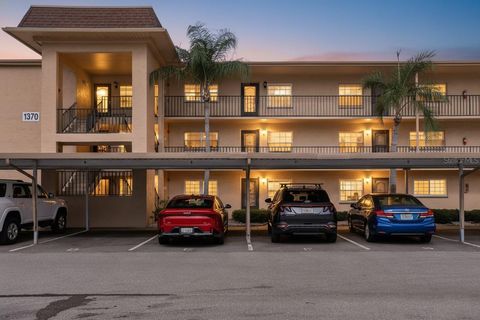Photo of 1370 Heather Ridge Boulevard #102, Dunedin, FL 34698 (MLS # W7885555)