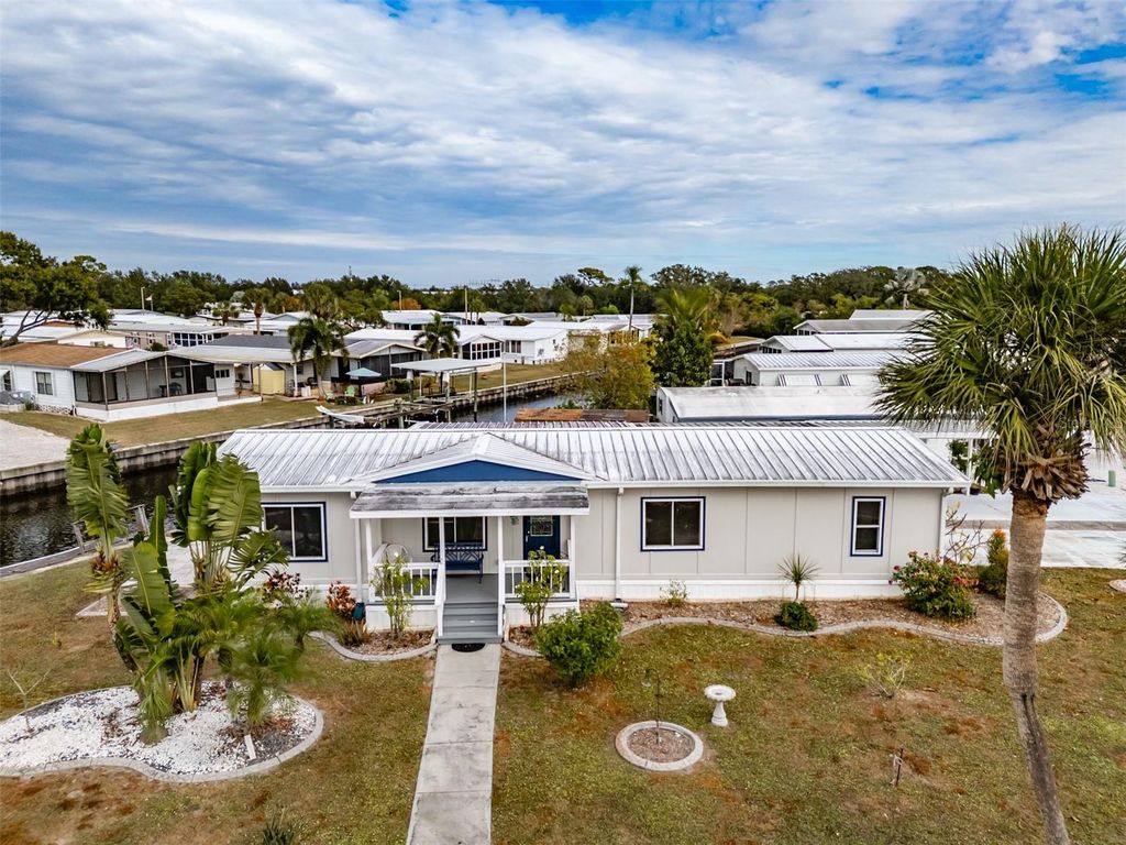 Photo of 143 E Saint Annes Cir, Apollo Beach, FL 33572 (MLS # TB8476714)