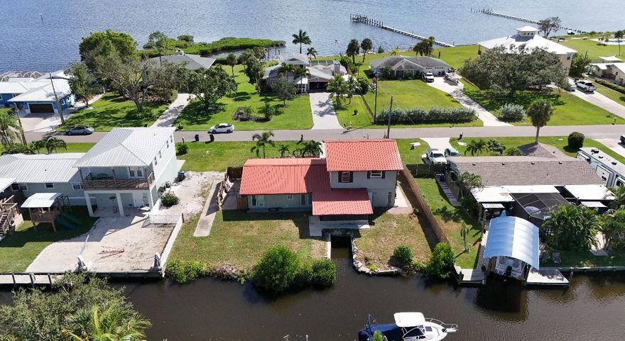 Waterfront opportunities like this are hard to find—direct canal access to the Manatee River and beautiful river views right from your own balcony make this one stand out immediately. If you’re looking for location, lifestyle, and upside potential, this home checks all three.

Located on a quiet, friendly street, you’ll enjoy a peaceful setting while still being just minutes from I-75 and close to Ellenton Premium Outlets for shopping and dining. It’s the perfect balance of privacy and convenience.

The home features a balcony overlooking the river—ideal for relaxing mornings or unwinding at the end of the day. Boaters will love the easy canal access straight out to open water.

Inside, the kitchen and bathrooms have been tastefully redone, offering a modern, move-in ready feel. There’s also room to add even more value with the primary suite, which is currently a blank slate ready to be finished to your vision.

A rare chance to own a waterfront property with views, access, and potential all in one.