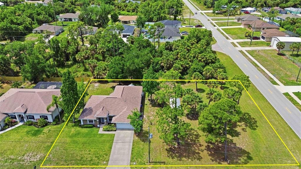 Photo of 4027 Quaker Lane, North Port, FL 34288 (MLS # C7524900)