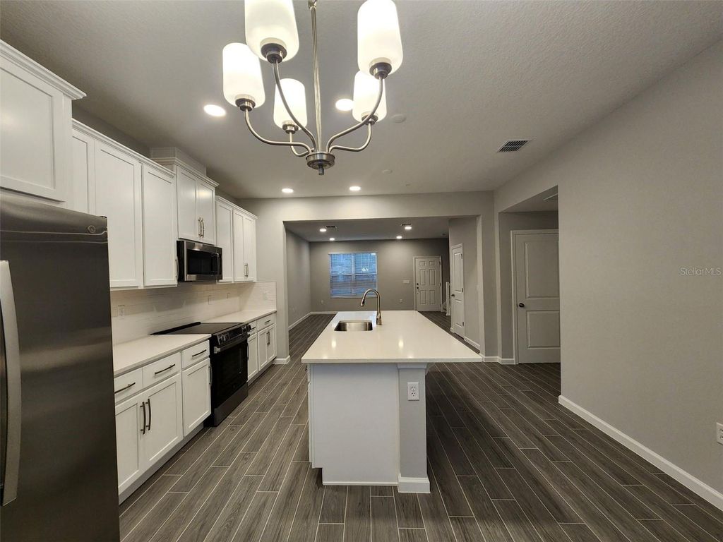 Photo of 615 Pothos Street, Apopka, FL 32703 (MLS # S5140279)