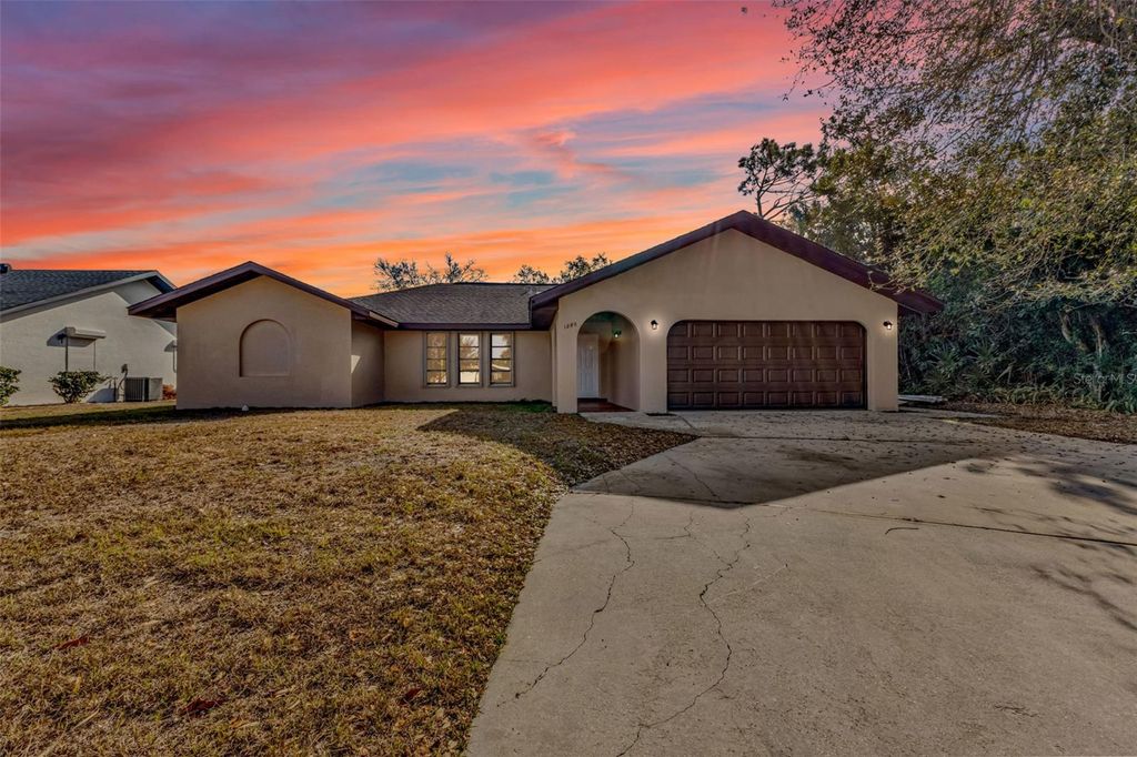 Photo of 1280 Inverness Street, Port Charlotte, FL 33952 (MLS # C7522692)