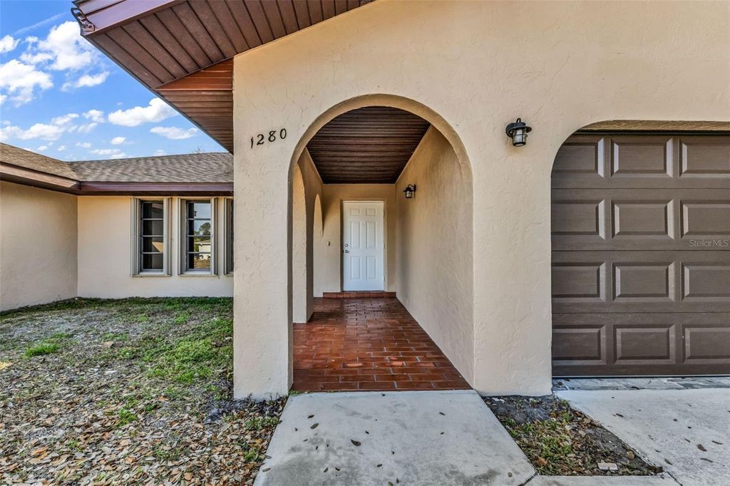 Photo of 1280 Inverness Street, Port Charlotte, FL 33952 (MLS # C7522692)