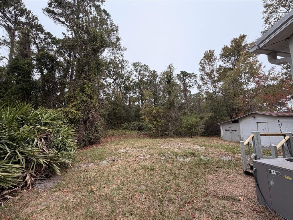 Photo of 212 Paradise Shores Road, Crescent City, FL 32112 (MLS # GC536022)