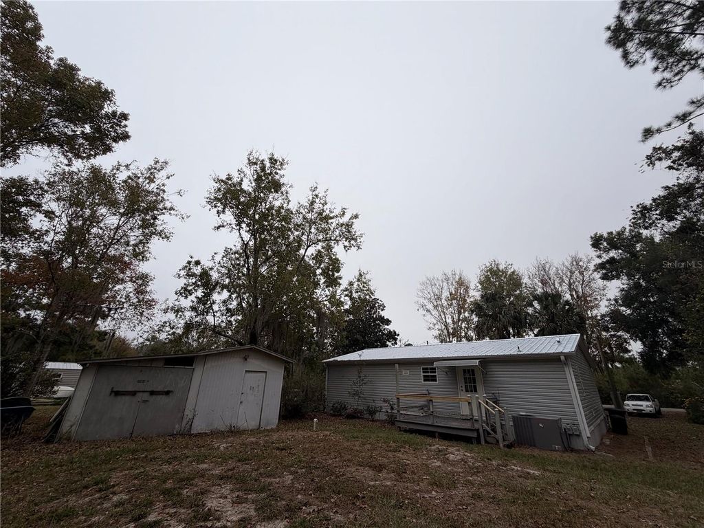 Photo of 212 Paradise Shores Road, Crescent City, FL 32112 (MLS # GC536022)