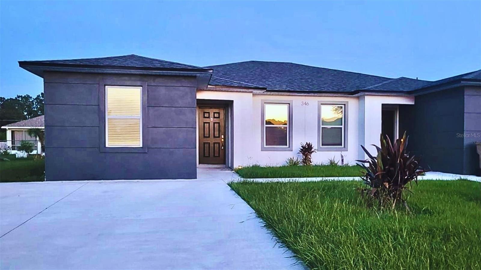 Available NOW! $0 Application Fee for Pre-Approved Applicants + FREE February Rent!. This newly built, charming 3-bedroom, 2-bathroom duplex offers a warm and inviting atmosphere in a peaceful, family-friendly neighborhood. The well-designed interior features modern finishes, including vinyl waterproof flooring, granite countertops, and wood cabinets. Each of the spacious bedrooms provides a comfortable retreat, while the two bathrooms are thoughtfully appointed with modern fixtures. Located in the serene and welcoming Poinciana Villages community, residents enjoy a safe and peaceful environment. This prime location offers easy access to shopping, dining, and entertainment options, as well as convenient access to major highways for commuting. Additional fees apply for lawn maintenance. INQUIRE NOW!