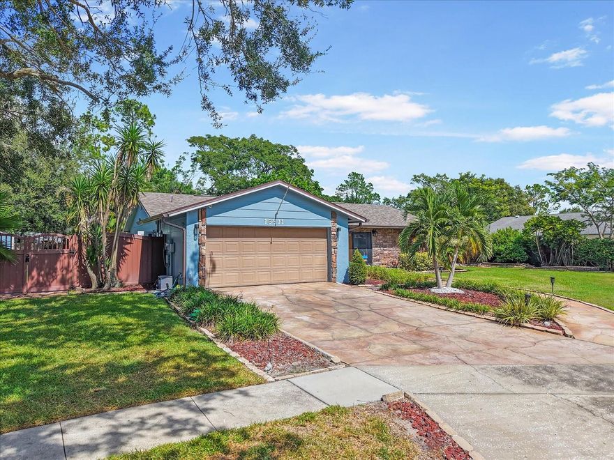 Fall in Love with 15911 Ironware Place. Fall is the season for hot cocoa, cozy fires, and cool new beginnings — and 15911 Ironware Place is ready to welcome you home. Nestled in the heart of Carrollwood’s highly desirable Country Place community, this 3-bedroom, 2-bath, 2-car garage pool home on private cul-de-sac, is truly move-in ready. Step inside and you’ll immediately feel the warmth and charm of the open, split floor plan featuring a spacious living and dining area, modern open kitchen, and an oversized lot perfect for entertaining. The screened-in lanai and sparkling pool make this home your personal retreat — ideal for gatherings with family and friends this holiday season. So many EXTRA'S...
New Vinyl Flooring (2022), HVAC, Roof & Water Heater (2021). Interior Repaint (2023). Recessed Lighting & Bathroom Exhaust Fan (2023), New Network Cables to Bedrooms for Faster Internet, Exterior Paint (2024), New Pool Filter (2024). 
Country Place offers a low HOA, no CDD, and access to community amenities including parks, playgrounds, tennis courts, and a picnic pavilion. You’ll love the prime location, minutes from Carrollwood shopping and dining, Citrus Park Mall, the Upper Tampa Bay Trail, and major highways like Dale Mabry, Veterans, and Suncoast Expressways and a short drive to Tampa International Airport.