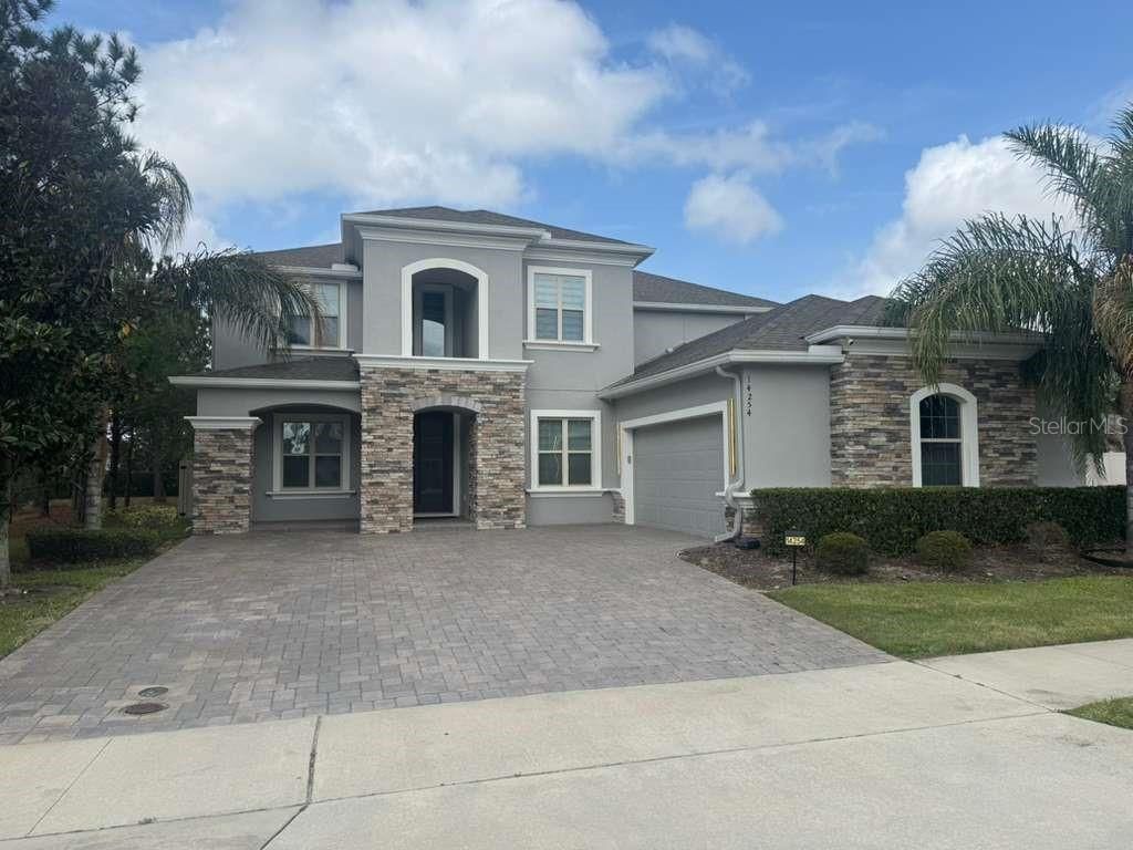 Photo of 14254 Sunridge Boulevard, Winter Garden, FL 34787 (MLS # TB8489171)