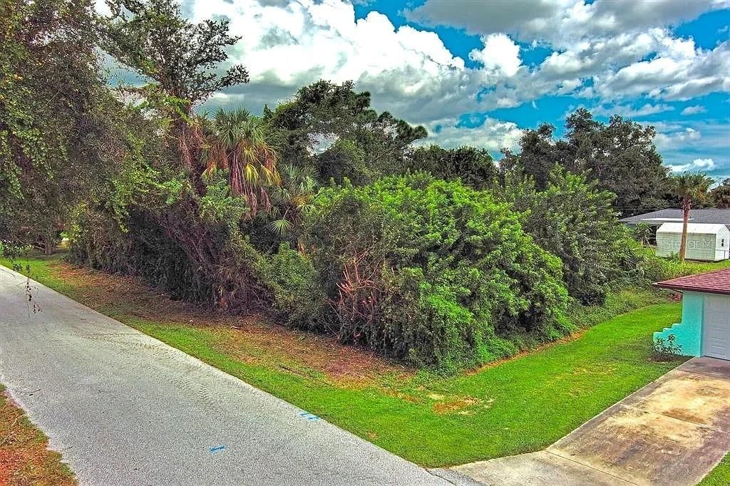Photo of 21511 Carleton Avenue, Port Charlotte, FL 33952 (MLS # O6344688)