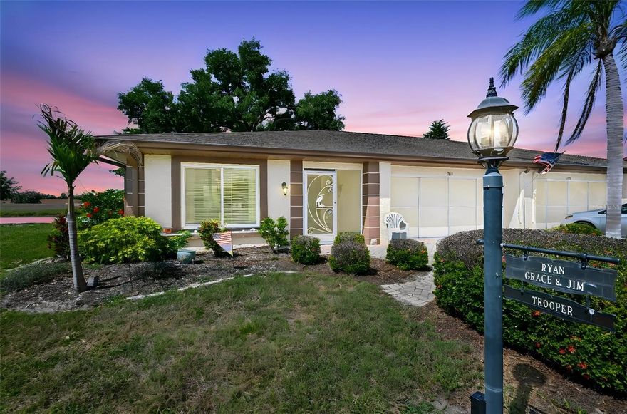Welcome to this beautifully updated and move-in ready home located at 2611 Locksley St., #250, offering stunning water views and exceptional indoor-outdoor living.

This spacious 2-bedroom, 2-bathroom home with a 2-car garage (featuring sliding screen doors and a hurricane-rated garage door) showcases thoughtful upgrades throughout. A screened entry welcomes you into a light-filled interior where laminate flooring in a soft maple tone flows through the great room, dining area, and hallway, complemented by tile flooring in the kitchen and Florida room.

The completely remodeled kitchen is a standout, featuring granite countertops, stainless steel appliances, custom wood cabinetry, pantry storage, and generous counter space. It opens seamlessly into the dining area, creating an ideal layout for entertaining. Enjoy peaceful mornings in the dinette while taking in picturesque water views accented by vibrant landscaping and blooming flowers.

The Florida room has been elevated to maximize comfort and style, with raised flooring, designer ceramic tile, two ceiling fans, and an impressive 16-foot hurricane-impact sliding glass door that frames breathtaking water views.

The primary suite offers a unique and functional layout, with the former walk-in closet converted into a convenient in-suite laundry room. The beautifully updated primary bathroom features dual modern vessel sinks set on quartz countertops, a pebble stone shower floor, elegant tile work, and sleek glass shower doors.

The guest bathroom is equally inviting, with tile flooring, a Corian sink, and a full bathtub—perfect for relaxing.

Additional highlights include: Paver driveway and rear patio, Updated electrical panel, Whole-house generator wiring, Popcorn ceilings removed, Tastefully landscaped yard with serene water views

With 1,529 square feet of living space (2,040 total), this home has been meticulously maintained and thoughtfully upgraded—truly nothing left to do but move in and enjoy.

Located within the highly sought-after Kings Point community, residents enjoy a vibrant, active lifestyle with access to multiple clubhouses, indoor and outdoor pools, fitness centers, golf, tennis, pickleball, and hundreds of social clubs and activities. Golf cart-friendly streets make it easy to explore the community, visit neighbors, or head to nearby shopping, dining, and medical facilities. This gated community offers both convenience and connection, creating the perfect Florida lifestyle.

Schedule your private showing today and experience the beauty, comfort, and lifestyle this home delivers!