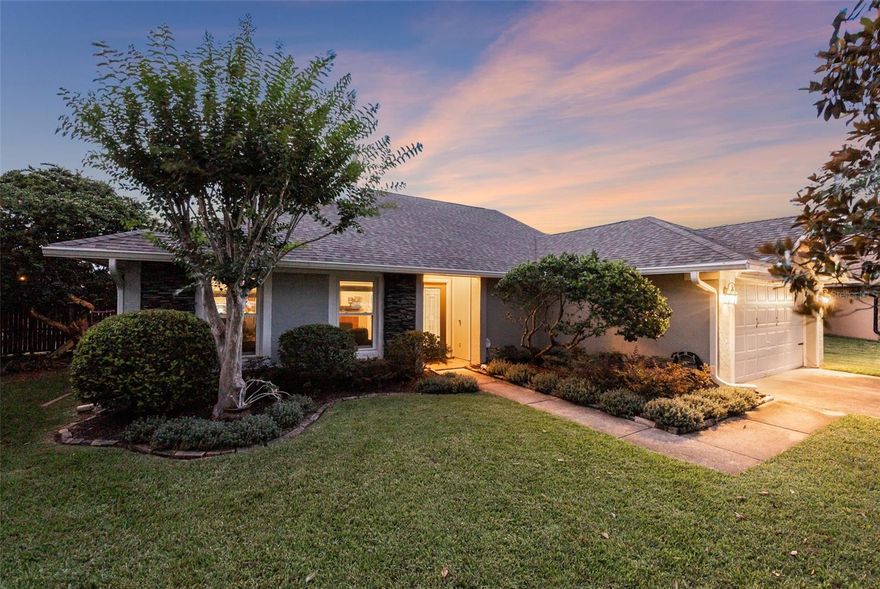 This stunning lakefront home, located in Lake Mary’s highly sought-after Lakewood at the Crossings community offers peaceful waterfront views from the family room or screened lanai. The exterior has been thoughtfully updated with fresh paint and sealing (2023), a newer roof (2022), chimney siding replacement, and a stone elevation for added curb appeal. A new driveway apron (2024) further enhances the property.
Inside, the home features a formal living room with a wood-burning fireplace and a formal dining room with a large picture window. The open layout boasts vaulted ceilings, plant shelving, and abundant natural light. The family room showcases triple sliding glass doors leading to the screened lanai, where you’ll find a custom gas-heated in-ground spa overlooking a spacious backyard and serene water view.
Interior upgrades include wood look tile flooring (2018) in the foyer, kitchen, family room, and a secondary bedroom. The remodeled master bathroom (2020) adds modern comfort, along with a guest bathtub replacement (2022). The kitchen and home systems are supported by a newer water heater (2020), updated AC (replaced in 2015 with new motor and capacitor in 2025), and major improvements such as new windows (8 of 11 replaced in 2018).
Conveniently located within walking distance to schools, parks, shopping, the library, and the YMCA.