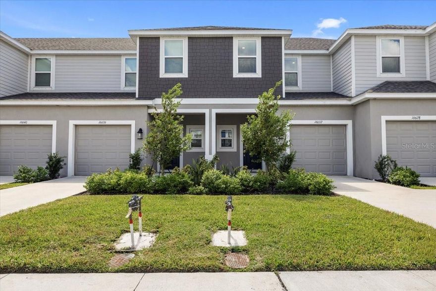 Skip the Waiting: Fully Furnished, Better-Than-New Lakewood Ranch Townhome with Lake Views and all the Upgrades Complete. 

Located in the desirable area of Lakewood Ranch within the Townhomes at Azario, this beautifully upgraded Jasmine floor plan offers 3 bedrooms, 2.5 baths, a one-car garage, and a true move-in-ready convenience. From the moment you walk through the door, you'll notice this home stands apart from the builder-grade competition and it is furnished so there is nothing else needed.

The open-concept living space has been elevated with a stunning custom feature wall showcasing modern wood acoustic paneling and a large-screen TV, creating a warm and inviting focal point for everyday living and entertaining. The kitchen has been upgraded with a designer porcelain tile backsplash, adding style and sophistication throughout the heart of the home.

Step outside and enjoy one of the home's most desirable improvements—a brand-new screened lanai with extended roof overlooking the lake, providing the perfect place to relax with your morning coffee or unwind after a busy day on your included outdoor furniture. Even the garage has been transformed with a premium epoxy floor featuring glow-in-the-dark flakes for a clean, polished finish.

Best of all, the brand-new designer furnishings are included with the sale, making this a rare turnkey opportunity. Simply bring your suitcase and start enjoying the Florida lifestyle from day one. King Nectar Premier Mattress and Queen Upgraded Rest and Renew Foam Mattresses are brand new along with all the furnishings included.

Upstairs, you'll find a spacious primary suite with a king bed, walk-in closet and quartz dual vanity bath, along with two guest bedrooms, a full bath with quartz countertop, and convenient upstairs laundry with washer and dryer included. Thoughtful storage throughout includes a walk-in pantry, linen closet, and under-stair storage.

The location couldn't be better. Walk to the brand-new Lake Manatee K-8 School, enjoy convenient access to the new Publix shopping plaza for grocery, self-care, or everyday needs. You will benefit from quick connections to both state road 64 and state road 70, making commuting and everyday errands effortless. Residents also enjoy a community pool, fenced dog park, low HOA fees, and all the amenities that make Lakewood Ranch America's top-selling master-planned community.

See it in person today — a model-like townhome with premium upgrades, lake views, furnishings included, and no waiting or move-in projects.