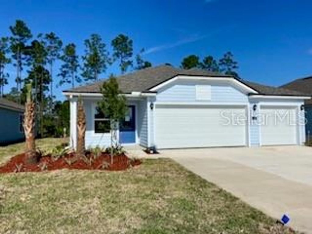Photo of 10 Lumber Jack Trail, Palm Coast, FL 32137 (MLS # FC299111)