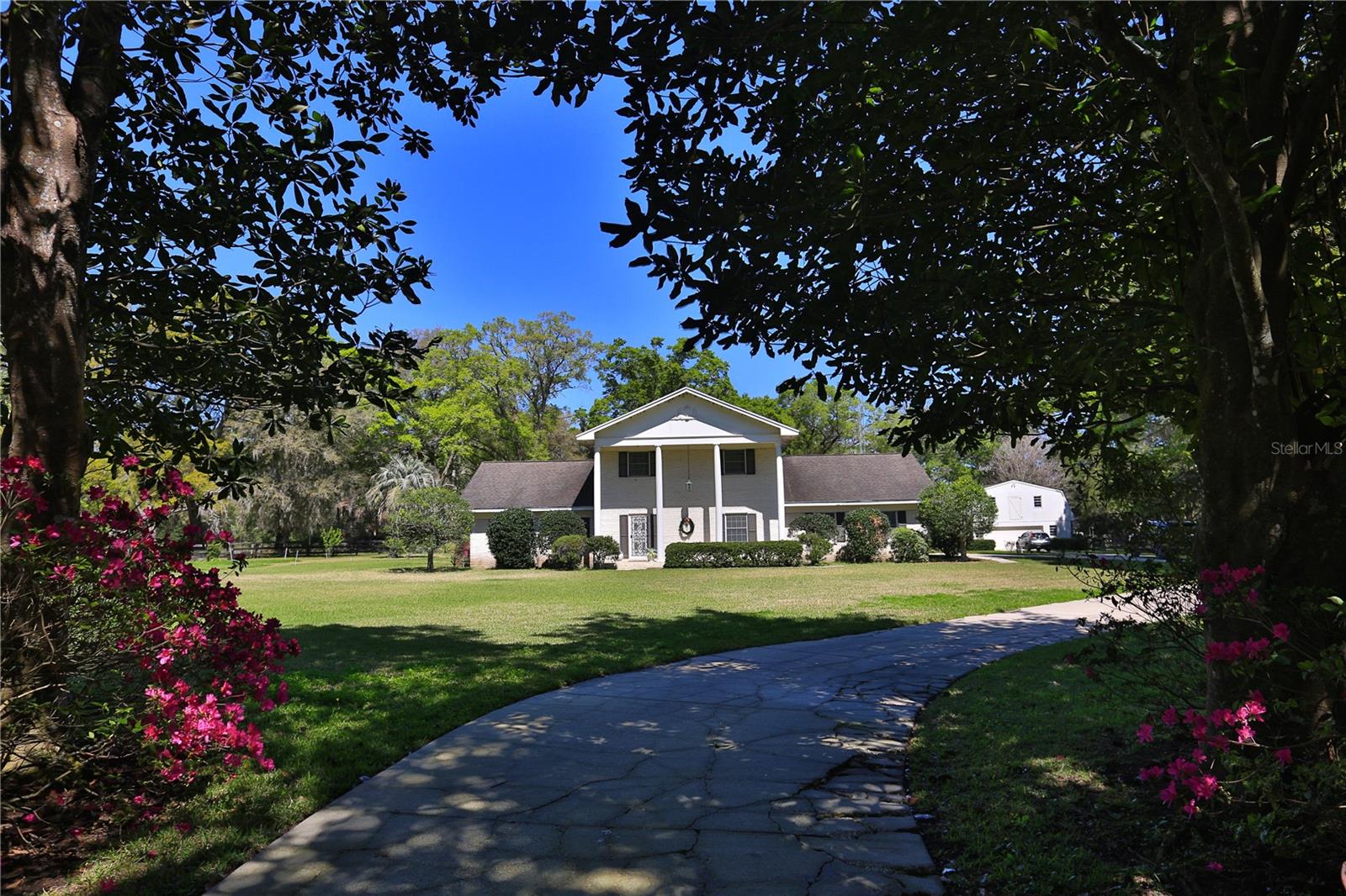Explore this stunning 18+ acre property that offers a wealth of possibilities in a serene country setting. Possibilities include family estate, land division or developmental land, your choice. This spacious home boasts five bedrooms, three full and two half bathrooms, along with a large dining area and family room that are perfect for gatherings. Unwind in the dedicated game room, designed for entertaining friends and family.
Step outside to discover your personal oasis, featuring a refreshing pool and a detached garage that includes water and electricity, as well as convenient RV parking.
Experience the perfect blend of relaxation and convenience—enjoy your expansive retreat while being just minutes away from downtown. With easy access to dining, shopping, entertainment, and medical facilities, this home perfectly combines the charm of country living with the benefits of urban life. Don’t let this unique opportunity pass you by!