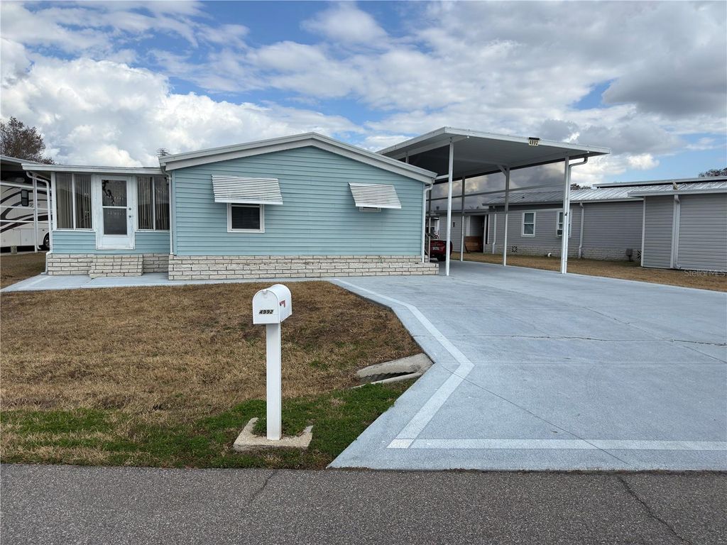 Photo of 4992 Shore Line Drive, Polk City, FL 33868 (MLS # P4937749)