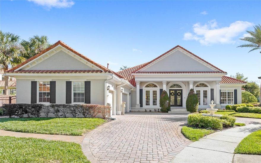 Discover an exceptional expression of modern luxury in the heart of Windermere. Welcome to 11051 Hawkshead Court, gracefully positioned within the prestigious Reserve at Lake Butler Sound—an exclusive guard-gated enclave renowned for its elegance, privacy, and lakefront lifestyle.

Set on an expansive half-acre homesite at the end of a cul-de-sac, this fully reimagined contemporary estate offers a seamless blend of sophistication and comfort. Spanning a thoughtfully designed single-story layout, the residence features five bedrooms, four full baths, and two half baths, all curated with impeccable attention to detail.

From the moment you enter, soaring ceilings and an abundance of natural light highlight exquisite porcelain marble flooring that flows seamlessly throughout the main living areas—completely carpet-free for a clean, modern aesthetic. The bedrooms feature rich hardwood flooring, adding warmth and contrast. The open-concept design creates an inviting yet refined atmosphere, ideal for both intimate living and grand entertaining.

At the heart of the home, the gourmet chef’s kitchen is a true showpiece, appointed with premium Viking stainless steel appliances, rich granite countertops, and bespoke custom cabinetry. Whether hosting elegant gatherings or enjoying everyday moments, this space is designed to impress.

Step outside to your private resort-style sanctuary. The covered lanai, complete with a fully equipped outdoor kitchen and grill, overlooks a beautifully redesigned pool framed by lush, mature landscaping—creating a serene and secluded backdrop for relaxation or entertaining under the Florida sun.

This home has been extensively upgraded with no detail overlooked, including a complete pool renovation with new equipment, a new screen enclosure, fresh exterior paint and lighting, two new HVAC systems, updated garage interiors and openers, EV charging capability, a new septic system, and a whole-home reverse osmosis water treatment system.

Residents of this distinguished community enjoy 24-hour guard-gated security, private fishing dock on Lake Butler, and impeccably maintained surroundings—all just minutes from world-class attractions, fine dining, upscale shopping, top-rated schools, and major thoroughfares.

This is more than a home—it is a statement of refined living in one of Central Florida’s most coveted addresses. Schedule your private tour today and experience it for yourself.