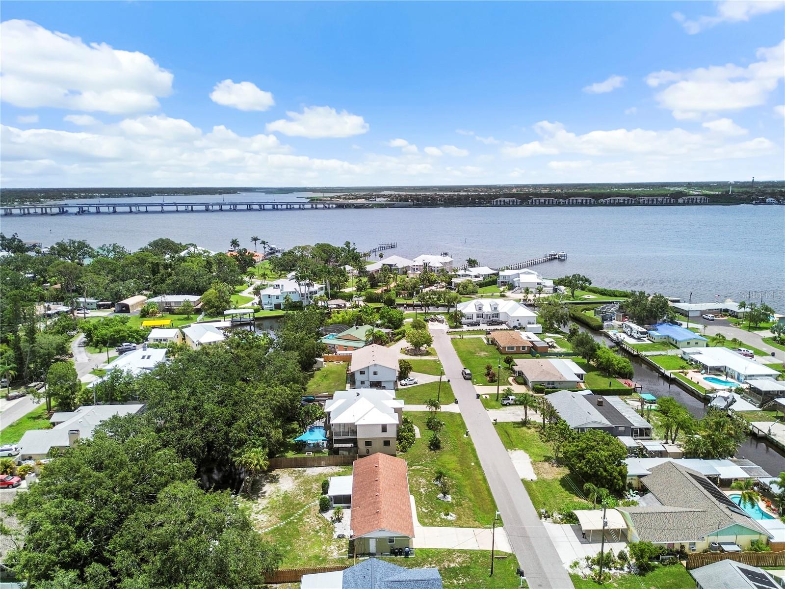 WATERFRONT! MAINTENANCE FREE! ACCESS TO THE MANATEE RIVER. BOAT DOCK. One Canal away. 1/4m from open River access. Annual rental available NOW. Yard maintenance included. Nothing to do but move in. Completely updated 2 bedroom 2 bath home on Saltwater canal with brand new boat lift and seawall. Bring your boat. This home has a dock that leads to the Manatee River in less than a minute idle time. Home has 2 car garage, open kitchen, dining area, and large great room. All new tile floors, kitchen cabinetry, and vanities. This home is immaculate, clean, and located in a charming waterfront community in Ellenton. Screened in lanai overlooks a large lot, and canopy covered canal. Fenced in yard. NO HOA. House did not sustain any hurricane damage. All applicants must complete an application and application fee of 75$ per adult. First month rent, last month rent, and security deposit due prior to move in. Ask about a lease purchase option. Pets only per owner approval and a nonrefundable pet fee of 350$. Tenant responsible for electric, water/trash and internet.