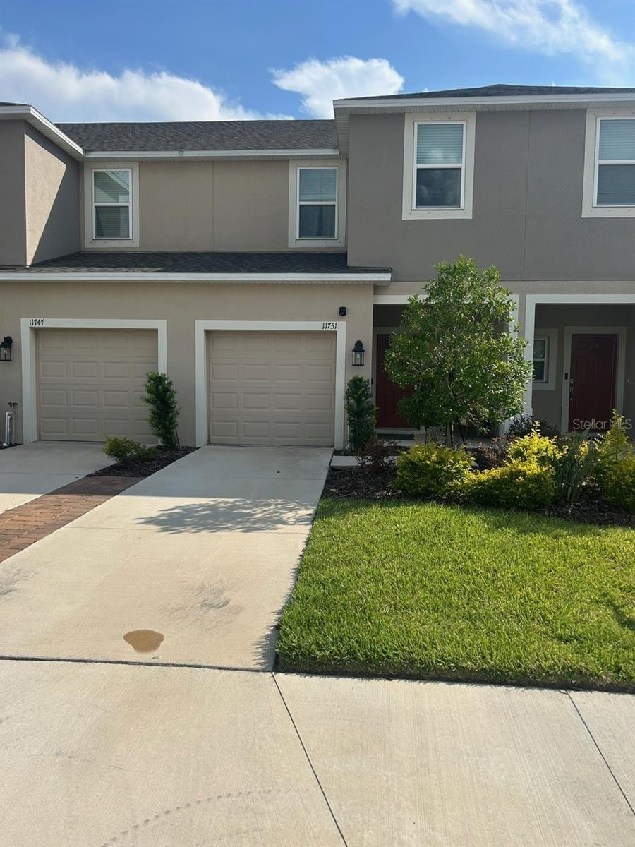 Nearly New 3BR/2.5BA beautifully maintained townhome with an attached garage, located in the highly sought-after community of Edgestone at Artisan Lakes. The open-concept layout features tile flooring throughout the main level and a stunning gourmet kitchen with a large island, quartz countertops, stainless steel appliances, and white shaker cabinets—ideal for everyday living and entertaining. A convenient half bath is located on the first floor for guests. Upstairs, you'll find all three bedrooms, including the spacious primary suite with a walk-in shower, dual vanity sinks, and a private ensuite bath. Enjoy low-maintenance living with access to community amenities. Perfectly situated near I-275 and I-75 for easy commuting to St. Pete, Bradenton, and Sarasota. Plus, you're just minutes from shopping, dining, and some of the best beaches Florida has to offer!