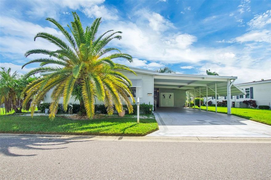 Welcome to Cypress Lakes Village—a premier 55+ resort-style community in North Lakeland where you can enjoy the country club lifestyle and own the land beneath your home! This charming WATERFRONT 1,568 sqft, 3-bedroom, 2-bath manufactured home offers comfortable living in one of Florida’s most desirable active adult communities. Unlike many similar properties in the community, this home is on deeded land, meaning you own it outright with no rising lot rent—just peace of mind and long-term value.

Step inside and you’ll find a bright, open floor plan with a spacious living and dining areas ideal for entertaining. The home features fresh newly installed carpet, neutral colors, and plenty of natural light. The dining area flows into a galley-style kitchen offering abundant cabinet storage, walk-in pantry, and an extended countertop for casual meals or prep space. A cozy breakfast nook with surrounding windows makes the perfect spot to enjoy your morning coffee while overlooking the peaceful backyard lake.

Just beyond the kitchen, sliding glass doors lead to a fully enclosed Florida room ( window unit AC) with expansive windows that fill the space with light—perfect for use as a sunroom, hobby space, or evening retreat. Additional features include a covered carport with ample parking for two vehicles, a utility/storage shed with built-in shelving and workbench.

The primary suite offers comfortable proportions, two walk-in closets, and an ensuite bath with dual sinks and a walk-in shower. Two additional bedrooms provide flexibility for guests, or use as an office, or crafts room, while the second full bath ensures convenience for everyone.

Living in Cypress Lakes means more than just a home—it’s a vibrant, active lifestyle. This secure guard gated community spans over 1,000 acres of beautifully maintained grounds and conservation areas, featuring two championship 18-hole golf courses, a full-service restaurant and bar, two sparkling resort pools and spas, a state-of-the-art fitness center, pickleball and tennis courts, a driving range, billiards and card rooms, and countless clubs and social events. There is even a storage area for your RV or Boat!!! From themed parties to arts and crafts, bocce ball, and the Big Cypress Bar & Grill, there’s always something to enjoy. https://covecommunities.com/55-mh-communities/florida/cypress-lakes-village/community-lifestyle/amenities/

Cypress Lakes is ideally located between Tampa and Orlando, offering quick access to shopping, dining, medical facilities, and major highways while still maintaining a peaceful, resort-like atmosphere. Whether you’re seeking a full-time residence or a seasonal Florida retreat, this home provides the perfect blend of comfort, community, and convenience—all with the added benefit of owning your land.

Come see why Cypress Lakes Village is one of Lakeland’s most sought-after 55+ communities and start living the Florida lifestyle you’ve been dreaming of. Schedule your private showing today!