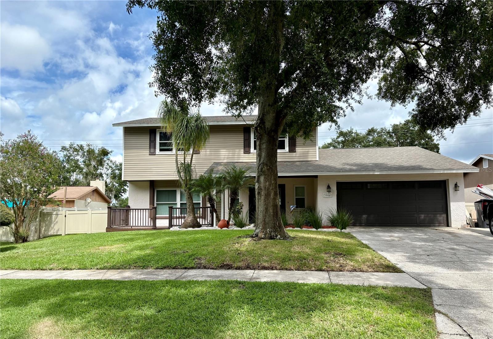 Stunning Home with tranquil views of your private pool set against a backdrop of lush greenery with a pond view!! Welcome to your dream family home in the the cozy Bloomingdale community! This spacious 4-bedroom, 2.5-bathroom residence offers over 2000 square feet of elegant living space, perfectly designed for both relaxation and entertaining. The entire home has just received a fresh coat of paint inside, giving it a modern feel from the moment you step inside! Upstairs, you'll find generously sized bedrooms with 2 of the bedrooms offering a balcony with a view! Enjoy Florida living year-round on your screened-in back patio and private pool, ideal for relaxing or hosting gatherings without worrying about bugs or weather. Located just minutes from top-rated schools, parks, shopping, and dining, this home combines the quiet beauty of nature with everyday convenience.