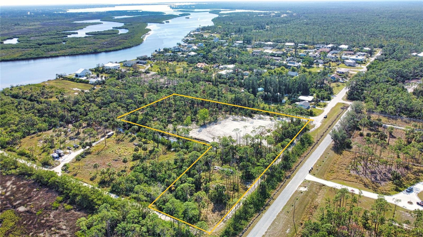 Seize this rare opportunity to build up to four single family homes on a stunning 4 acre parcel with direct access to Myakka River. Situated near Myakka State Park, this serene property is surrounded by Florida's natural beauty and offers a canal leading to the river—perfect for nature lovers and boating enthusiasts. Despite its secluded charm, the lot is conveniently located near Wellen Park’s amenities, with future River Road extensions enhancing access to Manasota Key Beach and the new high school. This property combines tranquility, convenience, and endless potential. This property is currently divided into 3 parcels, two x 1 acre and 1 x 2 acre. Zoning is one residence per acre, so you could subdivide to create a fourth 1-acre parcel. All parcels have clean environmental surveys. See individual listings A4637388, A4637409 and A4637412 for more information. The street address is for listing purposes only and will receive an actual street address once improved. Lot dimensions are approximate and should be verified by buyer. Please see additional parcels that are available - MLS # A4637388, A4637409, and A4637412.