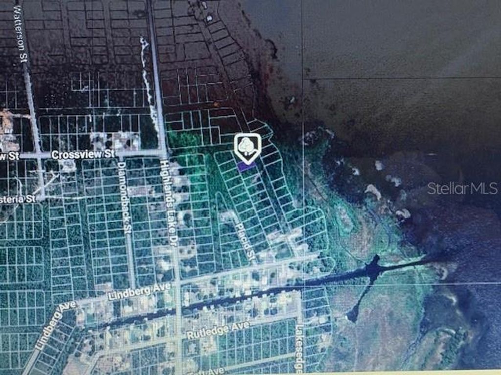 Photo of 744 Lakemont Drive, Lake Placid, FL 33852 (MLS # V4943684)