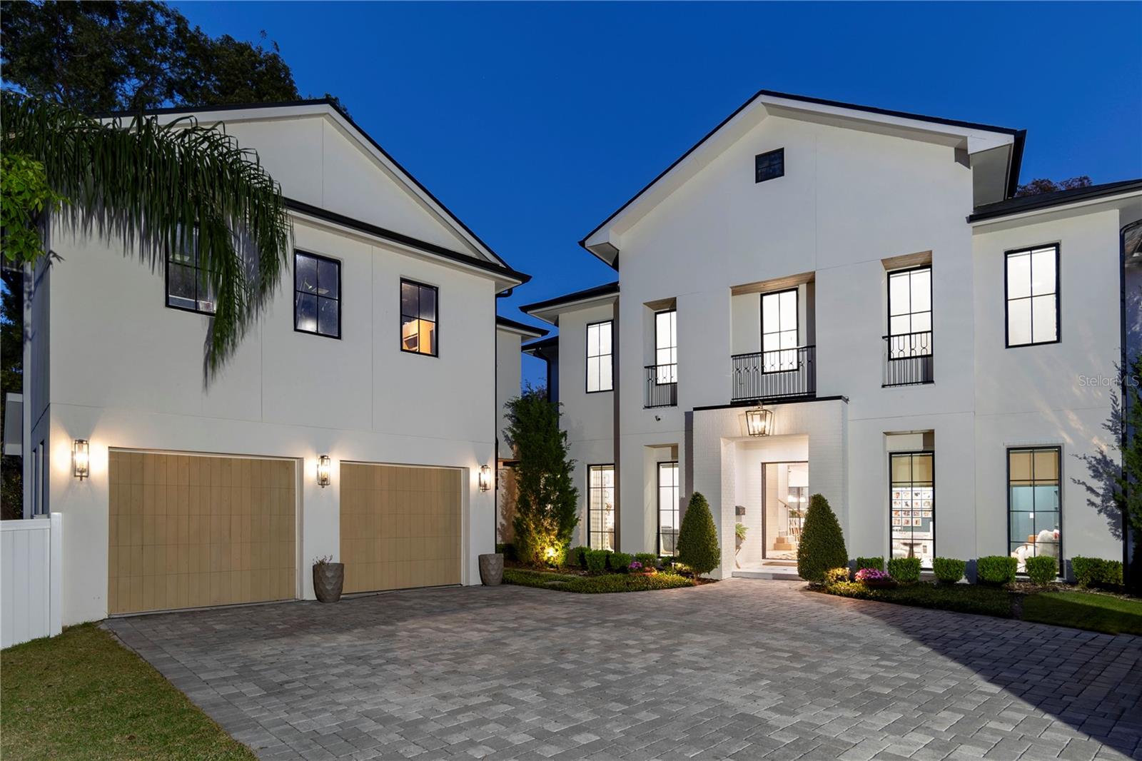This stunning private residence is situated on an oversized lot featuring a private sports pad, kids playground, and sparkling pool. Encompassing over 6,700 square feet of expansive .55 -acre lot, this home boast 5 spacious bedrooms, 1 office, 5.5 bathrooms and a dedicated movie room, recording studio, and a fully equipped gym with a private sauna. Ideally situated just moments from the serene Lake Maitland and the charming Azalea Park, this home offers both natural beauty and prime location. The chefs Kitchen is designed for both function and style with dual oversized islands, perfect for entertaining and everyday living. Spacious, inviting and thoughtfully designed, this oversized family room is the heart of the home-ideal for everything from cozy movie nights to lively holiday parties featuring expansive sq. footage, the room comfortably accommodates large groups, with plenty of space for multiple seating areas and a bar area. Oversized windows flood the space with natural light while the high ceilings and an open layout enhance the airy welcoming feel. Whether you are hosting extended family or entertaining friends, this room is built for connection, comfort and lasting memories. The private recording studio can be turned into a private mother in law suite or a kids play room.
The luxurious Private Primary Suite retreat to your own private oasis featuring a cozy fireplace, direct access to a serene private porch and a truly one of a kind walk-in closet designed for both style and functionality. The oversized ensuite bathroom boast a steam shower, creating a spa-like experience right at home. Two additional ensuite bedrooms upstairs, each with walk in closets. Thoughtfully designed for convenience this home features a spacious mud room off of the garage which is perfect for busy households. Enjoy the ultimate convenience with two separate laundry rooms, once located downstairs for easy access and a second upstairs near the bedrooms, making laundry day effortless and efficient.
Ideally located near the Winter Park Racquet Club, Interlachen Country Club, and walkable to Park Avenue, this exceptional residence also offers an extraordinary residence with a luxurious functionality and a premier location.